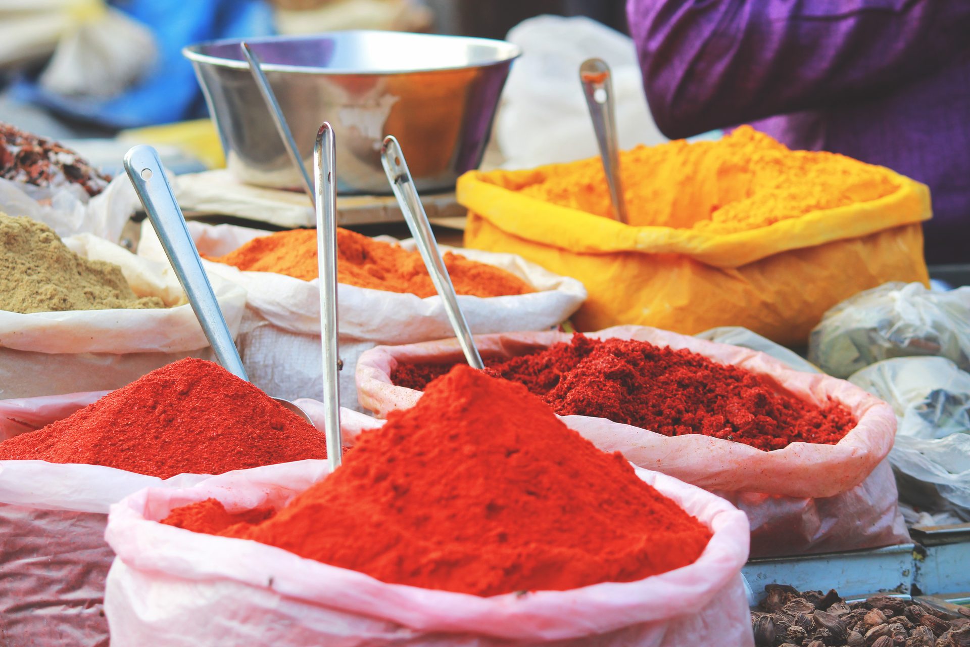 Bulk paprika and spices in open sacks — the scale of our supply